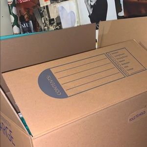 Mystery box of women/teen clothing.